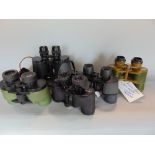 Five pairs of binoculars to include Japanese 8 x 30, 8 x 40, 7 x 35, Russian 8 x 40 and Empire 7 x