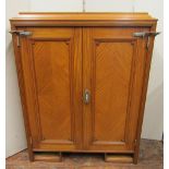 A good quality Art Deco satinwood wall mounted cabinet (possibly from a ships cabin) enclosed by a