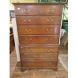 A Georgian oak chest on chest of six long and two short graduated drawers with brass swan neck