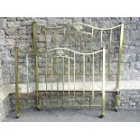 An Edwardian brass and iron 4ft 6 bedstead with square cut rails and pierced detail