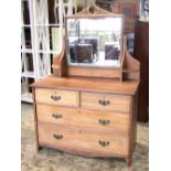 A late Victorian/Edwardian stripped mahogany dressing chest of two short and two long graduated
