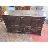 Early 18th century oak mule chest, the front elevation enclosed by four shaped and fielded panels