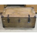 A heavy duty stripped pine box with hinged lid and side carrying handles, a Victorian tin trunk, a