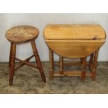 Five stools of varying design, two with later painted finish, a small pine oval drop leaf gateleg