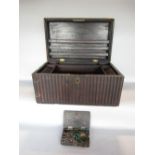 A 19th century United Arab Emirates pearl inlaid hardwood merchants chest, with reeded decoration