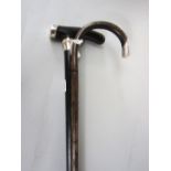 A slim crook handled bamboo type walking cane with silver knop, together with a further ebonised