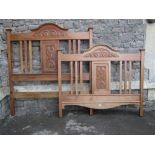 A Edwardian walnut 4ft 6 bedstead, with carved organic art nouveau style panels and moulded