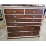 A substantial late Victorian walnut bedroom chest of two short over five long graduated drawers (