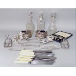 A mixed lot of silver plated items to include a good pair of pierced silver plated wine coasters,