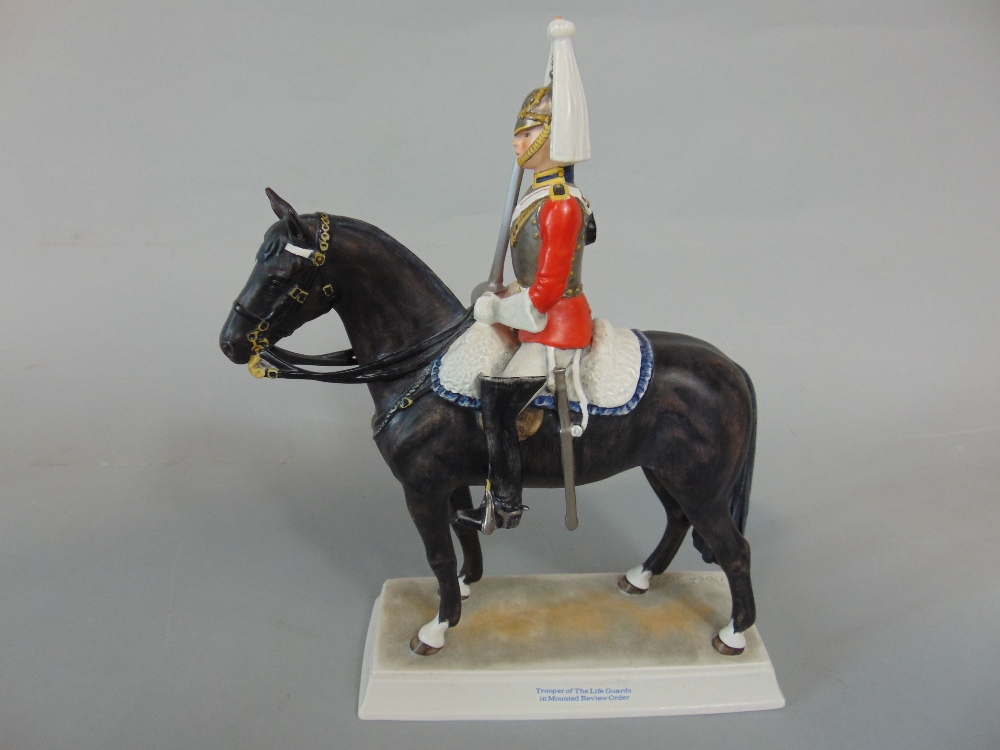A Goebel model of a Trooper of the Life Guards in the Mounted Review Order, 33cm tall approx