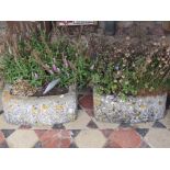 A pair of small natural stone troughs of rectangular form with single D end, 52cm long x 38cm wide x