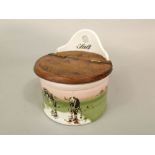 An early 20th century ceramic wall hanging salt crock with printed decoration of cattle with