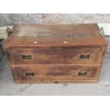 A low two drawer mixed wood chest in the military/campaign style with flush fitting handles