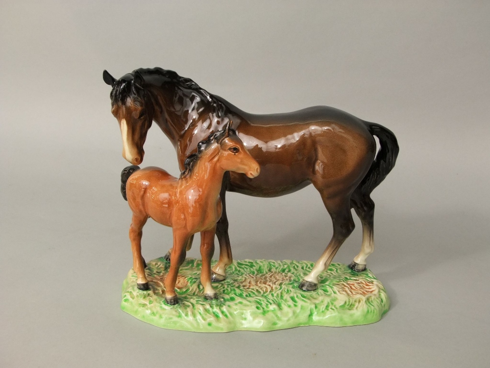 A Beswick group of a male and a foal raised on a moulded simulated grass base, together with two - Image 2 of 4