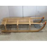 A beechwood sledge/toboggan with printed stamp Gloco Davoser