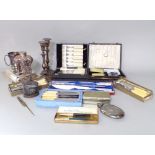 A collection of silver plated items to include an interesting silver plated hip flask, Sheffield