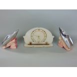 Art Deco kitsch alabaster clock garniture, the clock with pierced brass chapter ring and stylised