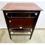 An Edwardian mahogany occasional table of rectangular form with four folding shelves and reeded