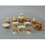 A collection of Aynsley Orchard Gold pattern wares comprising a cabinet cup and saucer, three