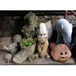A collection of contemporary novelty garden ornaments to include an elephant, a basset hound, an