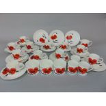 A collection of Wedgwood Susie Cooper design cornpoppy pattern wares comprising 14 cups, 12