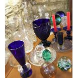 A mixed collection of various glassware to include four paperweights, four pieces of blue glass,