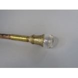 Interesting French walking cane, with gilt metal collar and circular glass knop with gilt