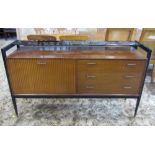 A Wrighton mid 20th century sideboard, the ebonised frame enclosing a teak veneered cabinet with