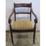 A 19th century mahogany bar back elbow chair with scrolled arms, reeded frame, drop in upholstered