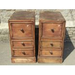 A pair of partially stripped pine and mahogany pedestals, each fitted with three long drawers set on