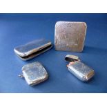 A mixed collection of silver to include two vesta cases, a cigarette case and a further white