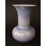 A Ruskin pottery vase with iridescent pale lilac glazed finish, with impressed mark to base and date