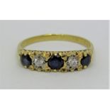 18ct sapphire and diamond five stone ring, size Q, 3.5g