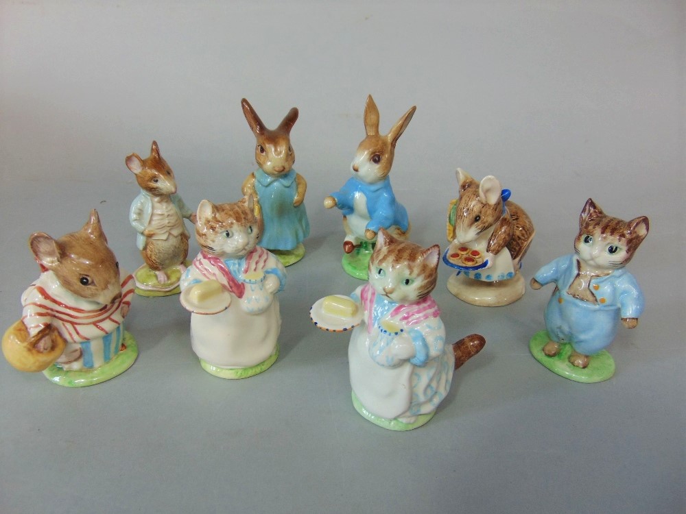 A collection of seven Beswick Beatrix Potter figures including Peter Rabbit and Mrs Flopsy Bunny,