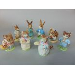 A collection of seven Beswick Beatrix Potter figures including Peter Rabbit and Mrs Flopsy Bunny,