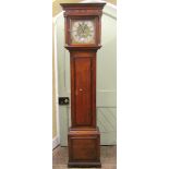 A Georgian oak longcase clock, the trunk enclosing a full length door, crossbanded in walnut, the