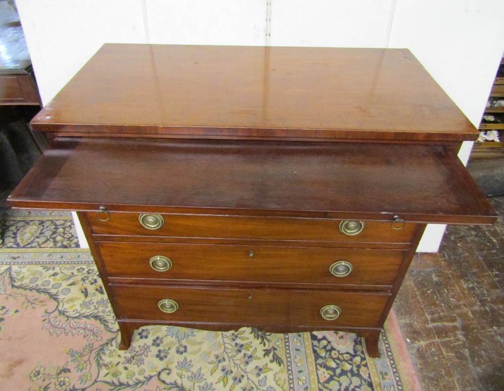 A small Georgian mahogany chest of four long graduated drawers together with a brush slide, shaped - Image 2 of 2