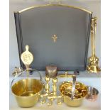 A large collection of polished brassware to include two pans, fire dogs, companion set, etc (a