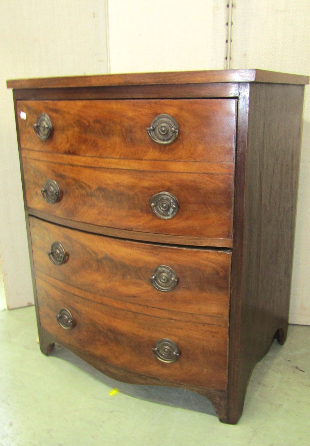 A small 19th century mahogany caddy top bedroom chest of three long graduated drawers with shaped - Image 4 of 4