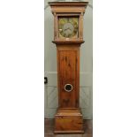 A Georgian pine country made longcase clock, the stripped case enclosing a square brass dial with
