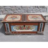 A substantial 19th century continental pine blanket chest with original painted detail showing