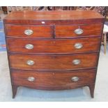 A Regency mahogany bow fronted caddy top bedroom chest of two short over three long graduated