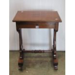 A Victorian mahogany sewing/work table of rectangular form with moulded outline over a frieze drawer