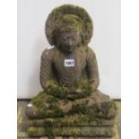 A weathered stone Buddha/Deity in a seated cross legged pose, with well defined features, 42cm