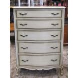 A reproduction light green painted bedroom chest, the serpentine moulded front fitted with five long
