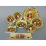 A collection of Aynsley Orchard Gold pattern bowls and dishes of various size including circular