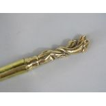 Walking cane with cast brass knop in the form of a coiled snake around a branch