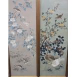 Two early 20th century oriental embroidered silk panels showing birds feeding amongst foliage, 11