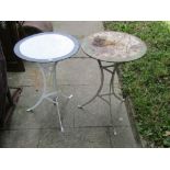 A pair of vintage steel bistro/lamp tables, the swept tripod supports supporting circular painted