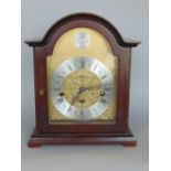 Woodford three train musical type mantel clock playing on five chimes, the brass dial with steel